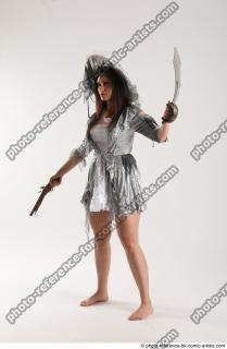 2020 01 LUCI AVIOL STANDING POSE WITH GUN AND SWORD…